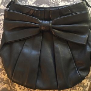 Black leather crossbody bag with bow detail